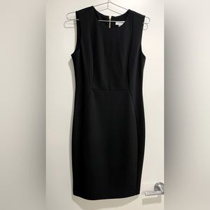 Calvin Klein black dress. Brand new with tag still attached. Size 8.